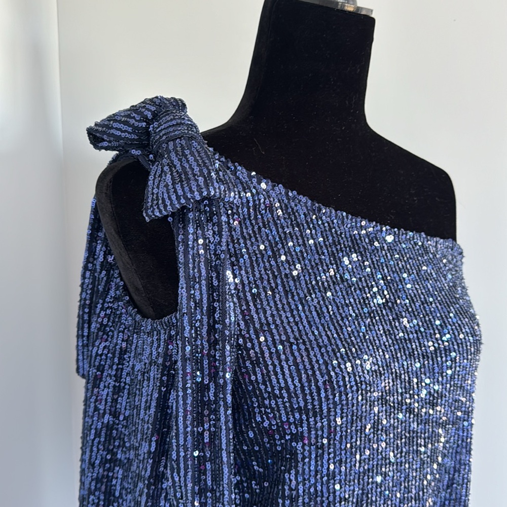 New, CeCe navy blue sequin off shoulder bow top. Size M.